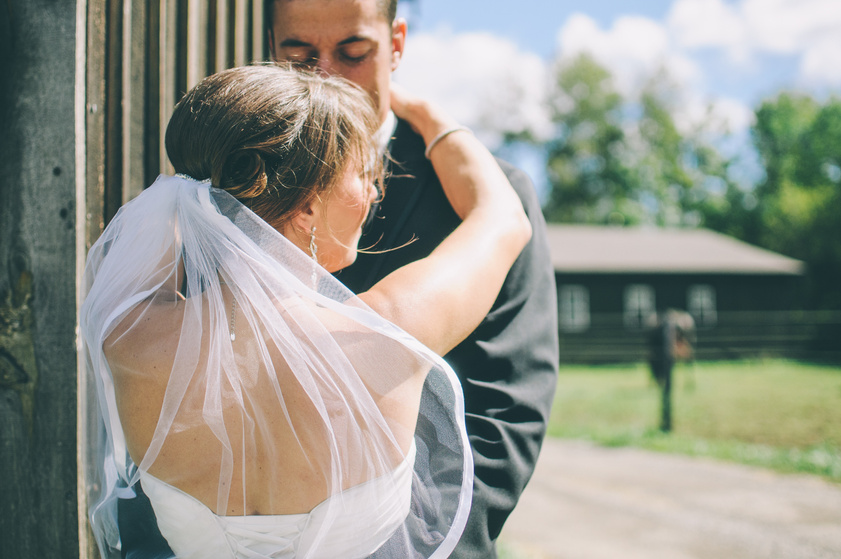 Wedding Couple Posing Outdoors